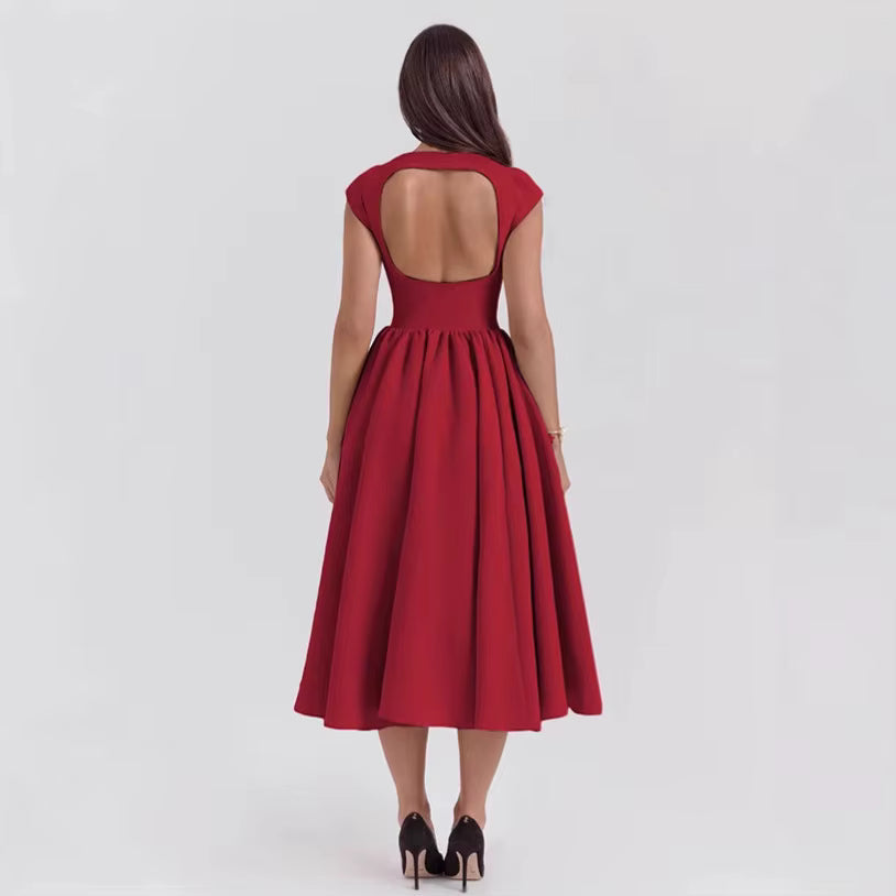 Red dress with open back on a white background