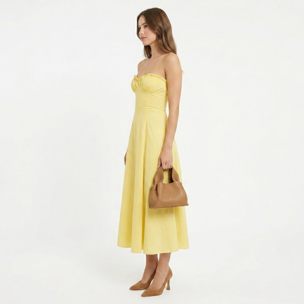 Millicent yellow bustier wedding guest midi dress - fabric detail