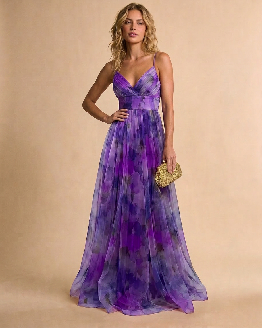 Woman wearing a purple floral dress against a beige background