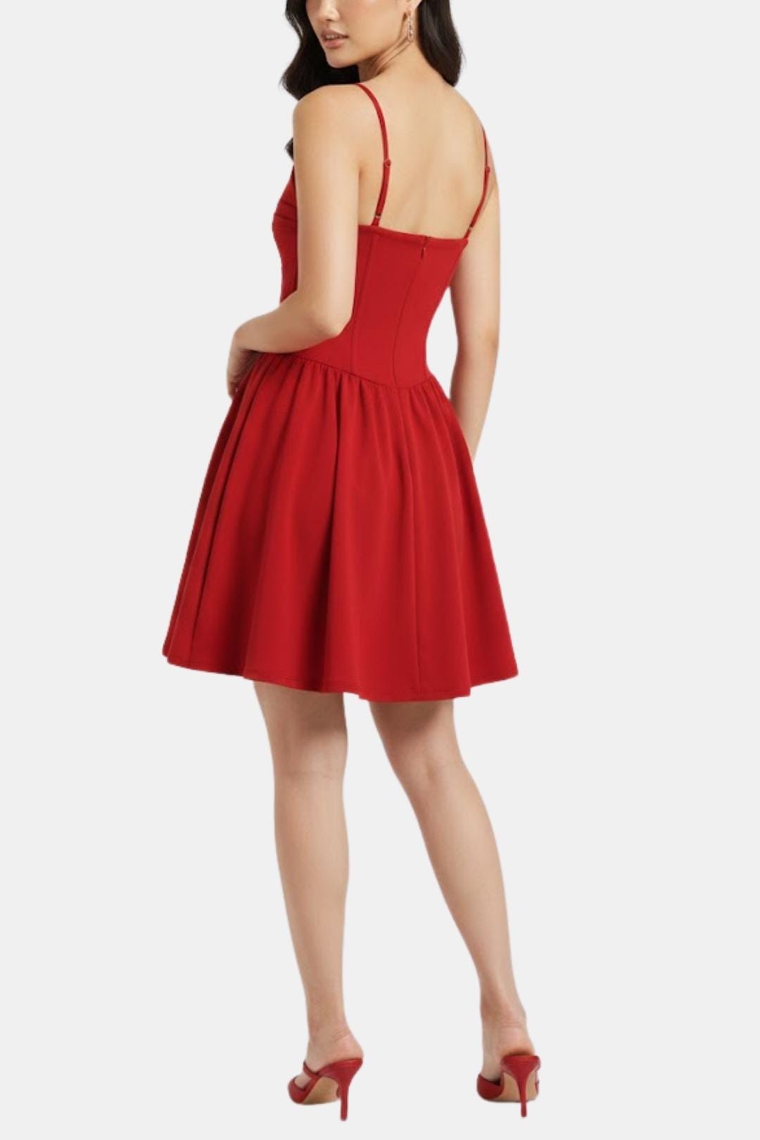 Red dress worn by a model on a white background